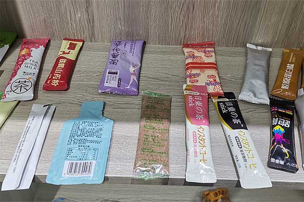 奶茶粉末包裝機可采用三邊封、四邊封、圓角袋型